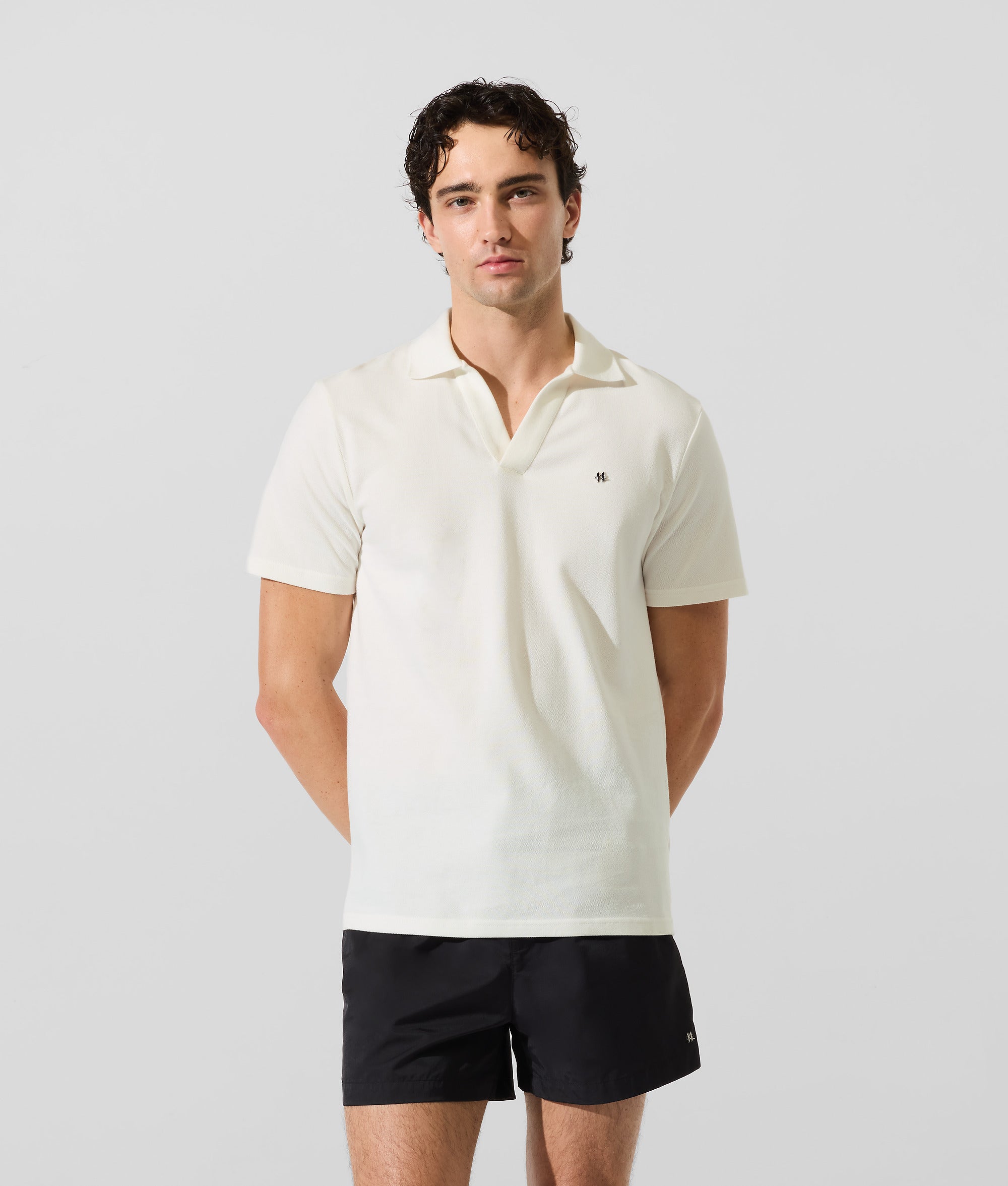 Monogram pin polo shirt